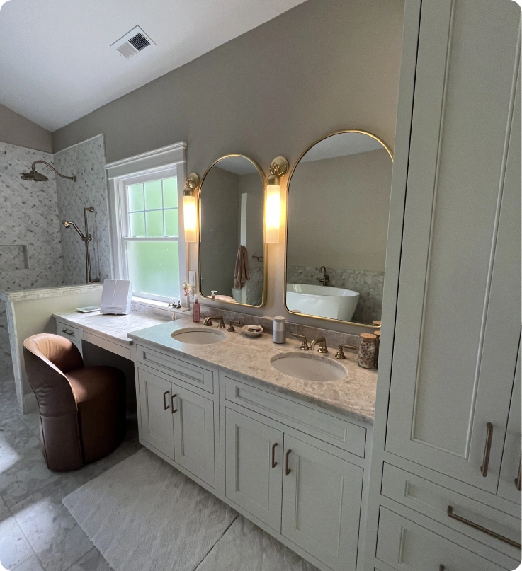 Modern bathroom with dual sinks.